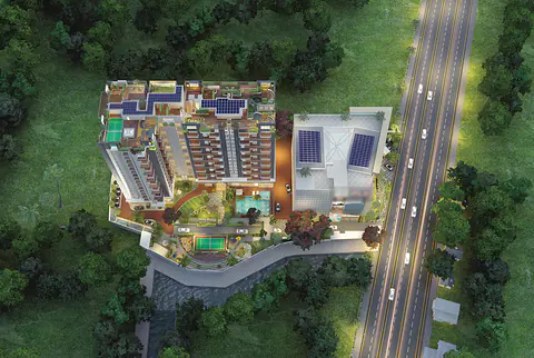 Top-down aerial view of the site: the tower with rooftop solar panels, podium pool, courts and gardens, and the mall block beside the main road