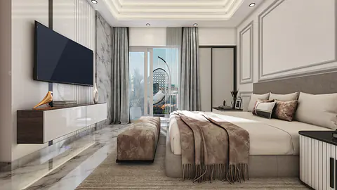 Bedroom with a padded headboard wall, wall-mounted TV unit and full-height windows with city view