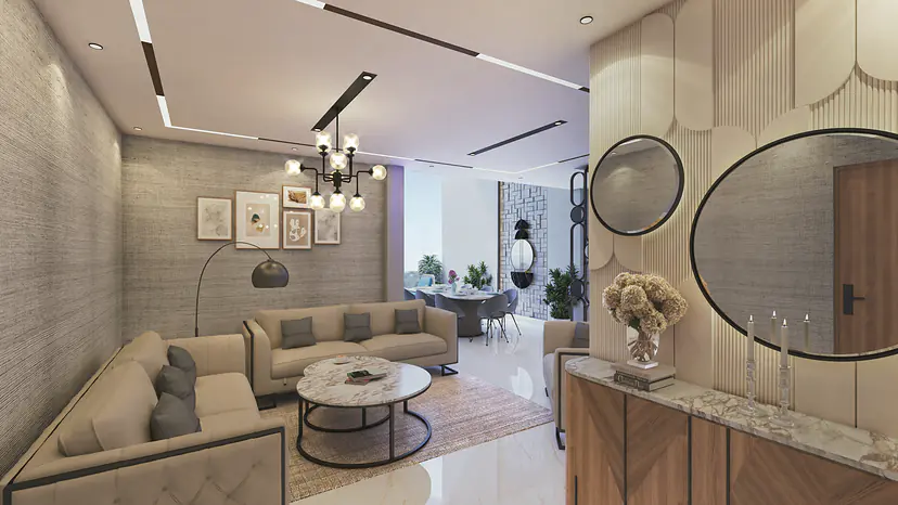 Living room with a beige sectional sofa, round coffee table, arched mirrors and a dining area beyond