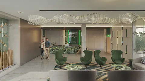 Jade entrance lobby: double-height space with a green onyx reception desk, green egg chairs and timber-slat walls