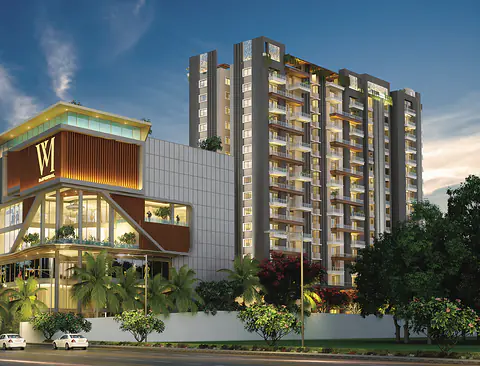 Pretium Mall at dusk: a glazed multi-level frontage with timber fins and a monogram on the facade, with the residential tower behind
